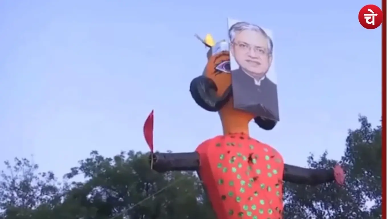 A symbolic protest was staged by placing a picture of Gyanesh Kumar on the head of a Ravana effigy